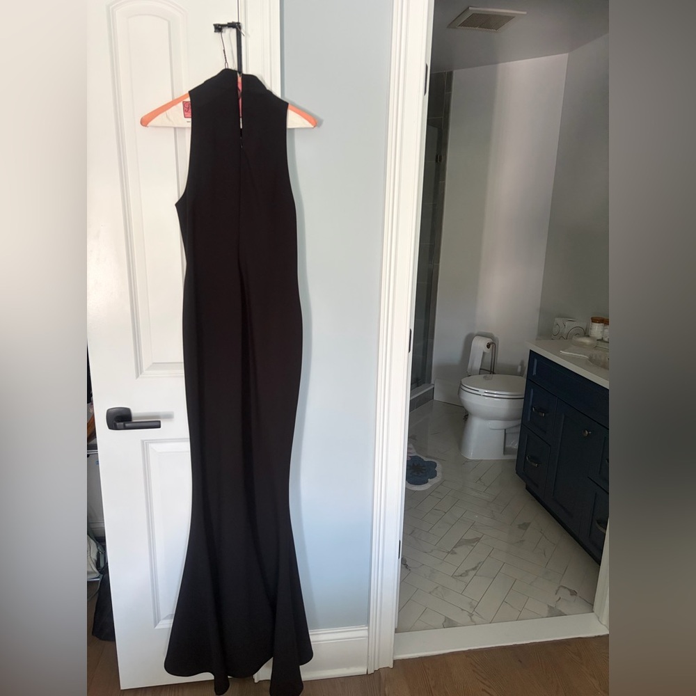 Likely Black Sleeveless mermaid bottom dress.